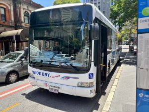 Wide Bay Transit 93 outside Central Station doing Rail Replacement work.