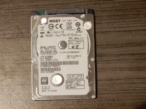 Top lid of a HGST HTS545050A7E680 hard drive.